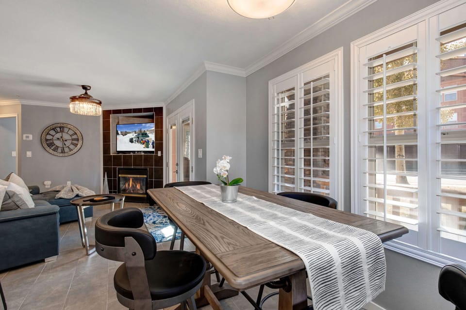 Cozy corner with dining table and stylish sofa set.