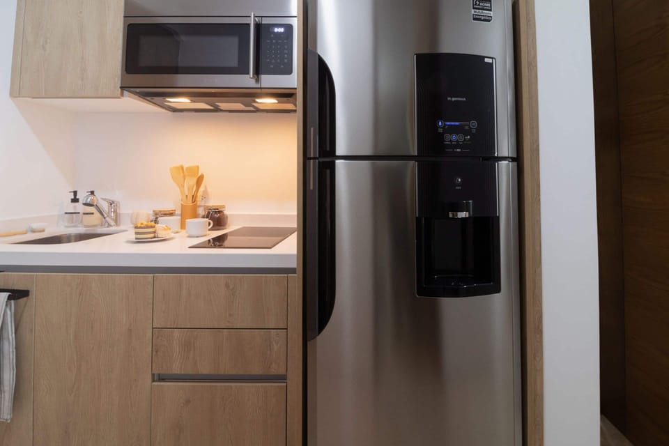 Family Room | Private kitchen | Fridge, microwave, stovetop, coffee/tea maker