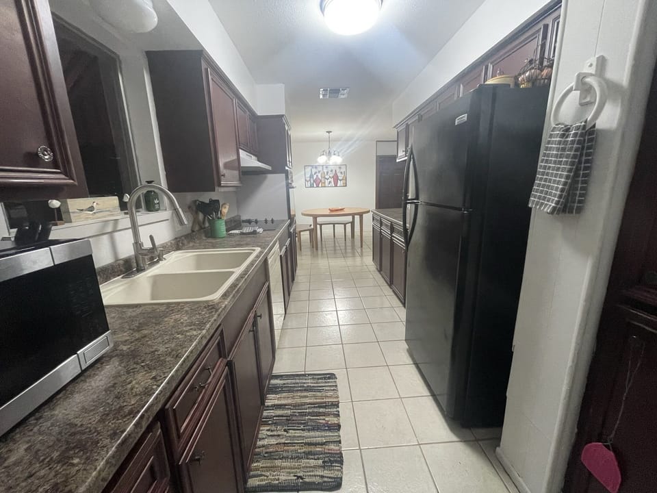 Family sized kitchen with all appliances (electric stove and oven).  