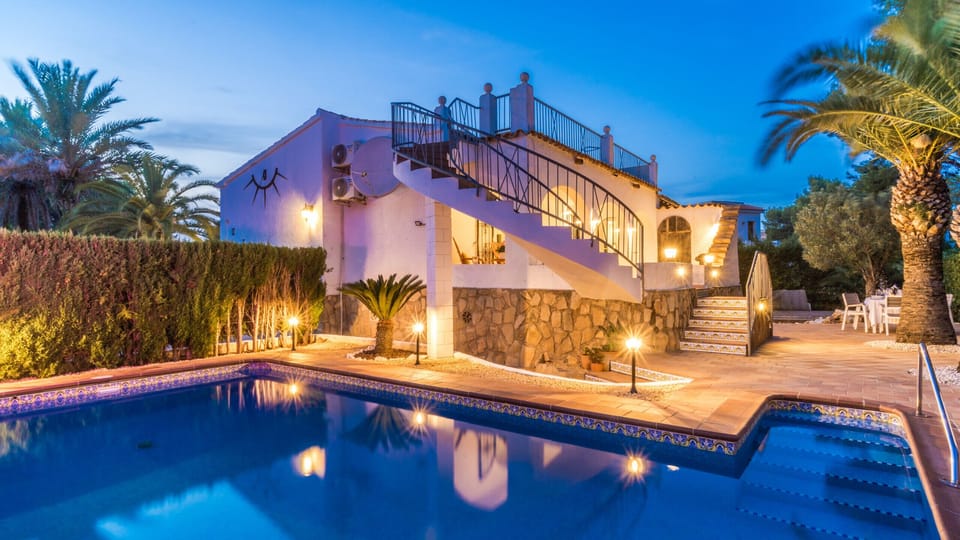 House and Pool at Night
