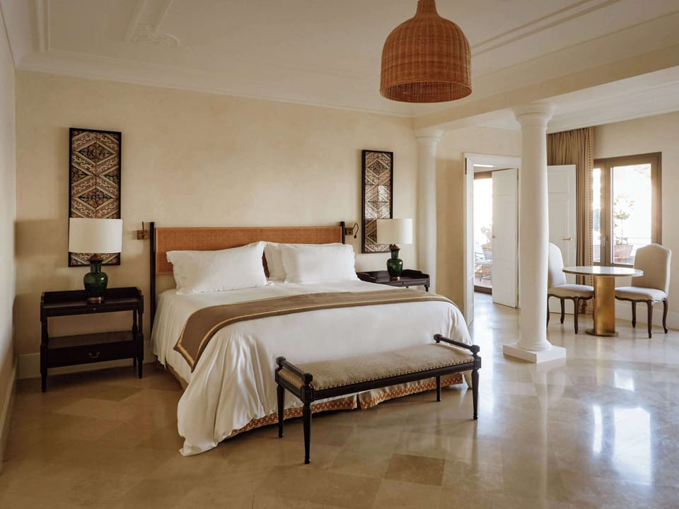 Suite (Villa Sant Andrea) | Down comforters, minibar, in-room safe, desk