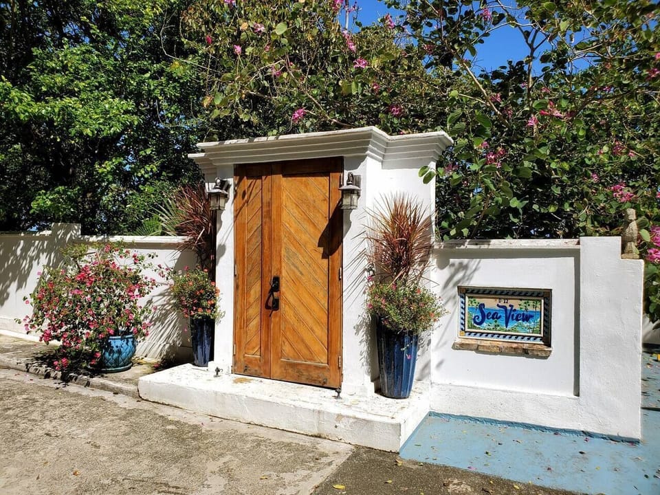 Enter through the mahogany door to your tropical oasis