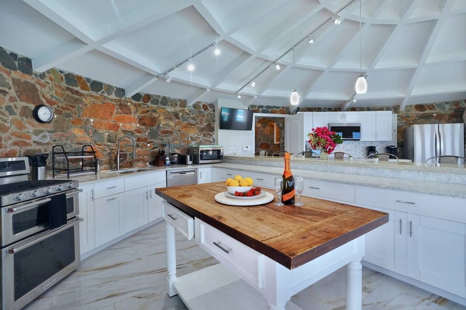 "The kitchen is huge and awesome - double almost every appliance and expansive view."