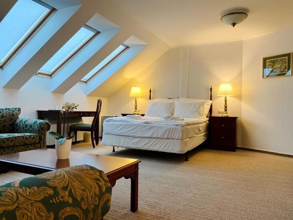 Deluxe Quadruple Room (No elevator) | Minibar, desk, iron/ironing board, free WiFi