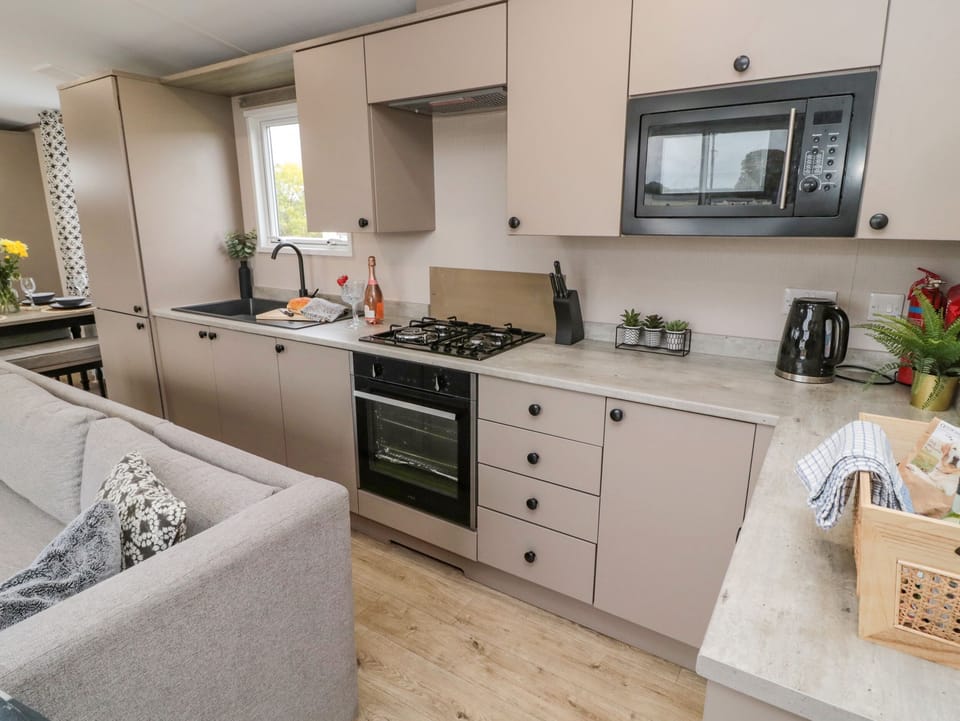 Fridge, electric kettle, toaster, cookware/dishes/utensils