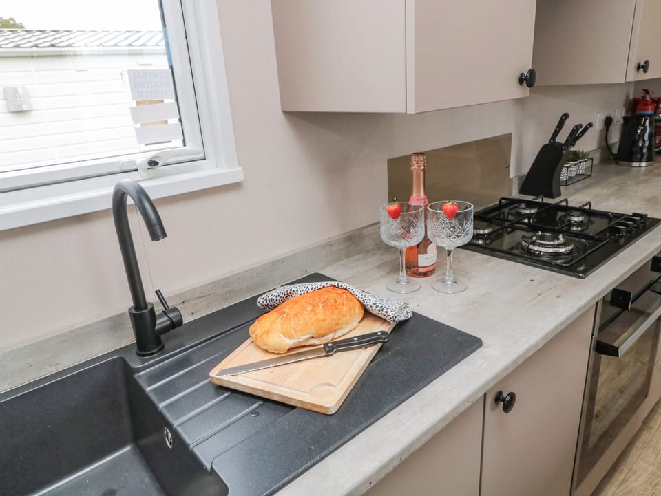 Fridge, electric kettle, toaster, cookware/dishes/utensils