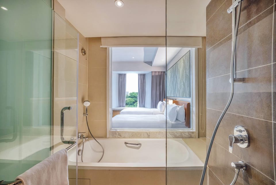Premier Room, 2 Twin Beds (Skyline View) | Bathroom | Combined shower/tub, free toiletries, hair dryer, bathrobes