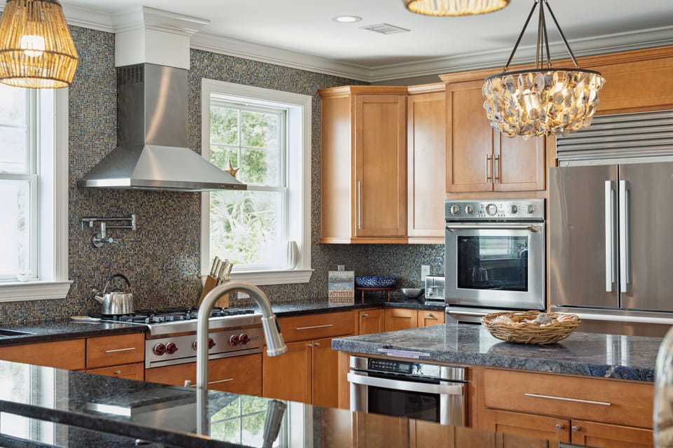 View of the spacious kitchen from the bar.