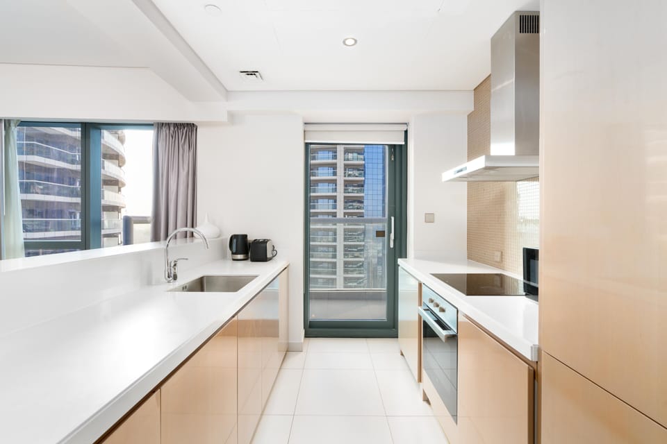 Luxury Apartment | Private kitchen | Full-size fridge, microwave, oven, stovetop