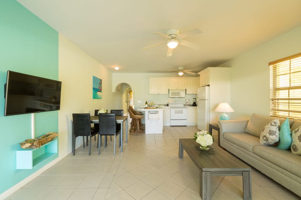 Condo, 1 Bedroom, Pool View | Living area | Flat-screen TV