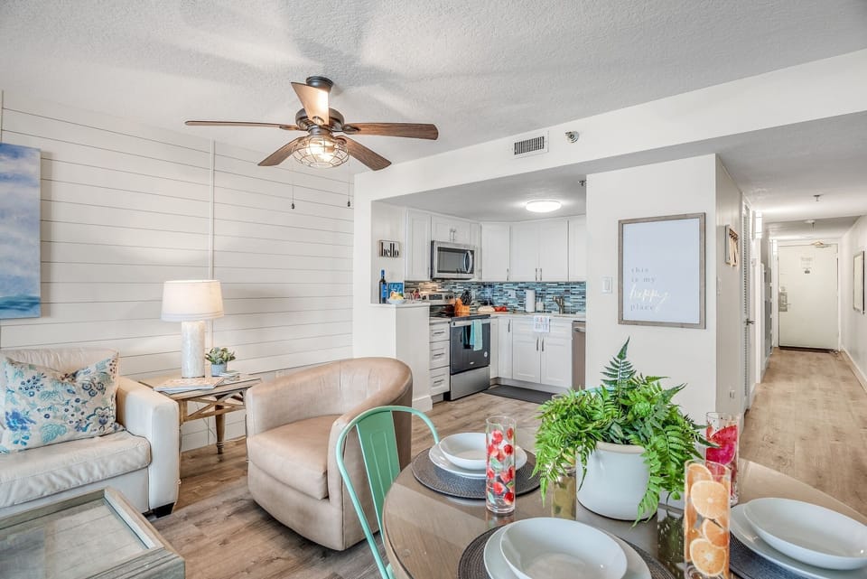 Relax in your bright, coastal-inspired living space with stylish furnishings, modern kitchen, and thoughtful touches that make you feel right at home.