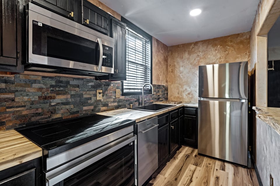Condo, Patio | Private kitchen | Coffee/tea maker, microwave, toaster oven