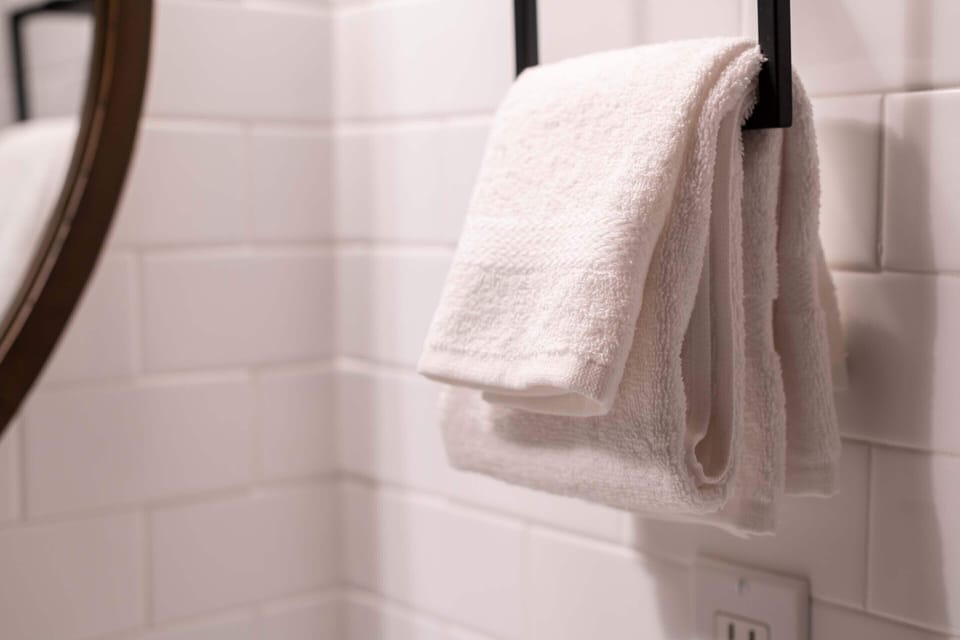 Hair dryer, towels, soap, shampoo