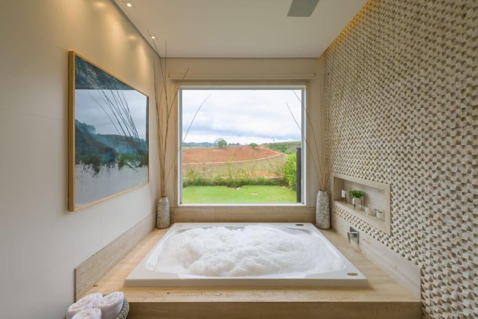 Luxury Suite | Bathroom | Hair dryer, bathrobes, towels, soap