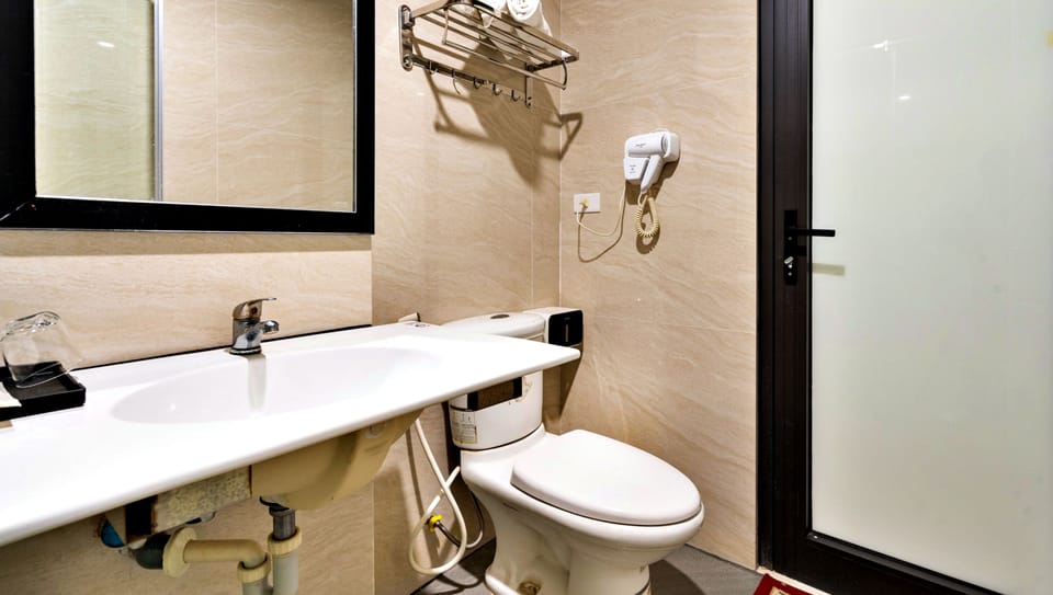 Shower, hydromassage showerhead, designer toiletries, hair dryer