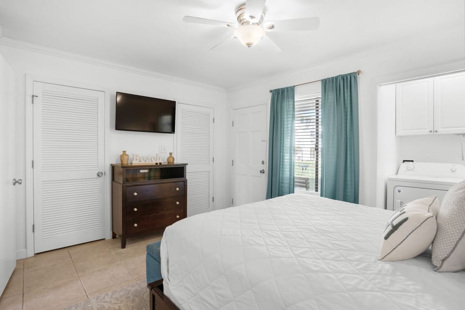 Master bedroom with flat screen TV