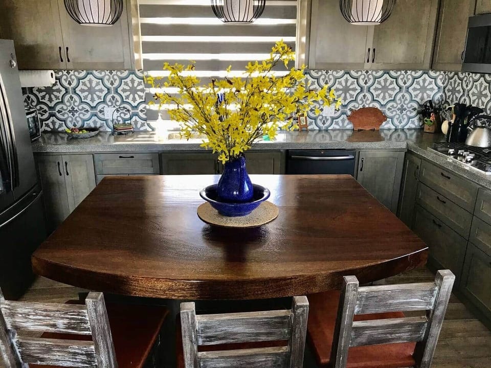 A fully-equipped kitchen allows you to cook at home.  Or, hire one of the many talented local chefs to come in and pamper you.