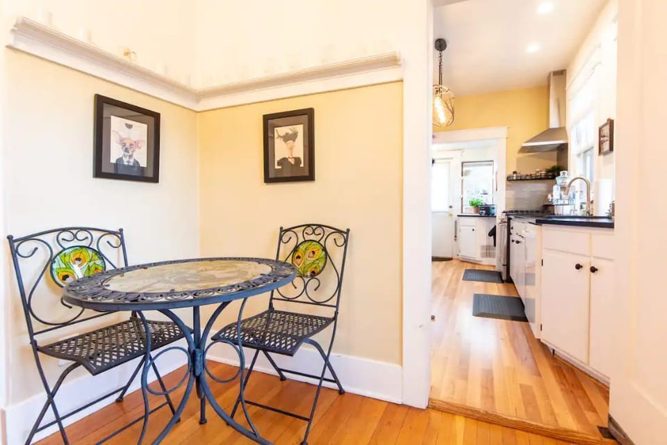 Third chair available in dining room closet.  Access to basement & washer/dryer.