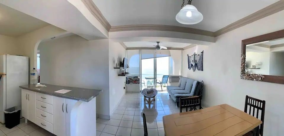 Comfort Condo | Living area | 30-inch TV with cable channels