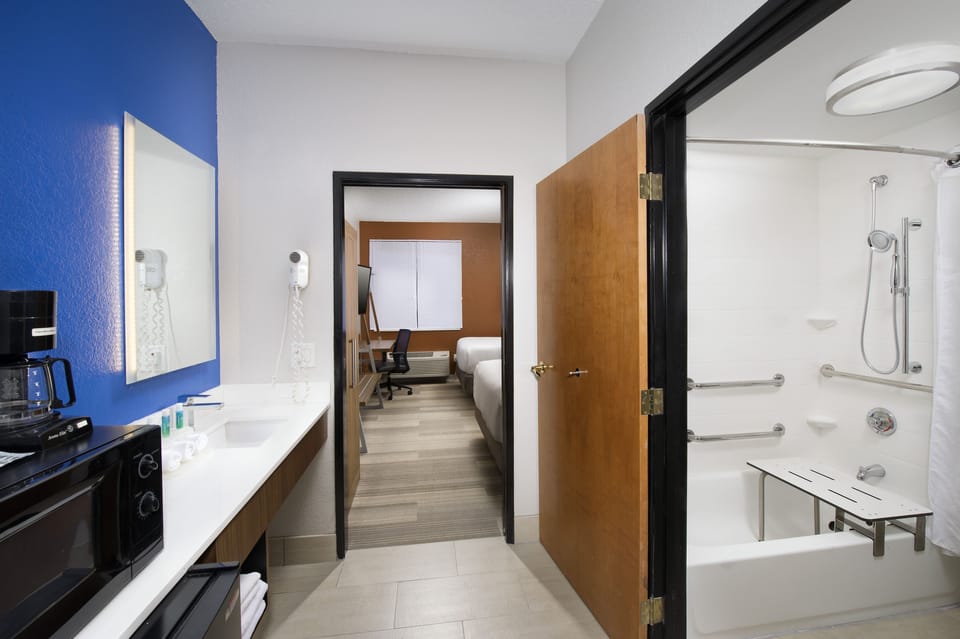 Suite, 1 King Bed with Sofa bed, Accessible (Mobility, Accessible Tub) | Bathroom | Combined shower/tub, free toiletries, hair dryer, towels