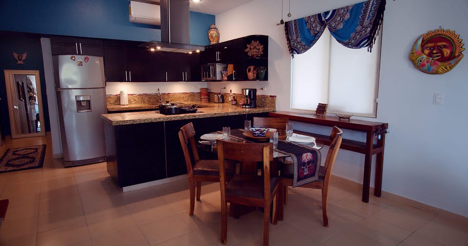 The large open kitchen and dining area offers some good choices for meals.