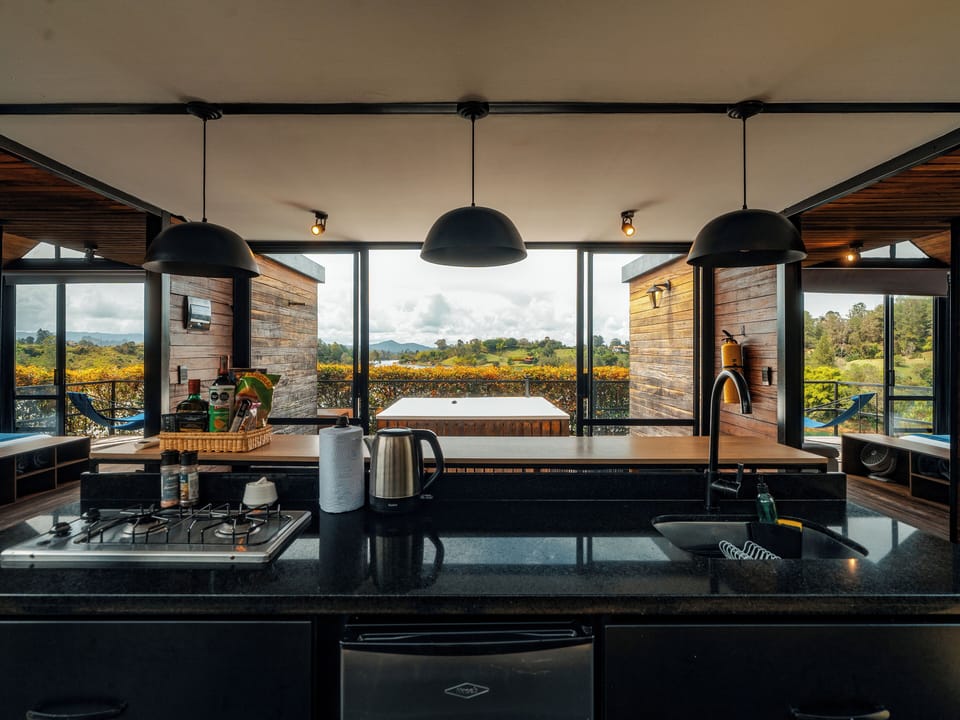 Family Room | Private kitchen | Mini-fridge, cookware/dishes/utensils