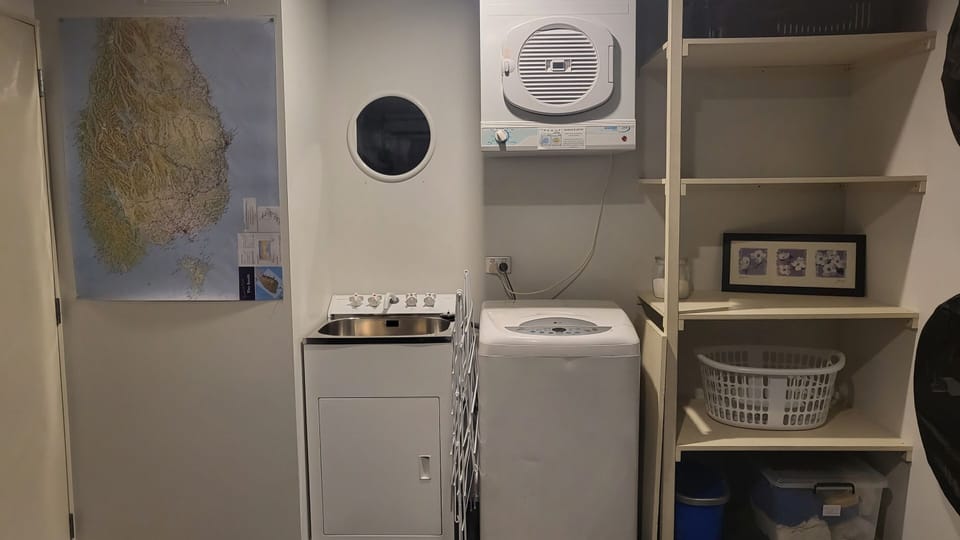 full laundry with washer and dryer