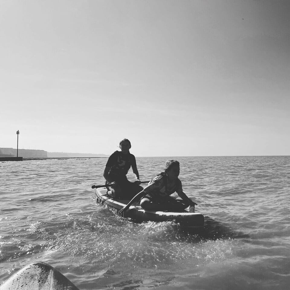 The Baldwin Children on Paddle Board Hire From Kent Surf School  - Eva's View - seastay.co.uk