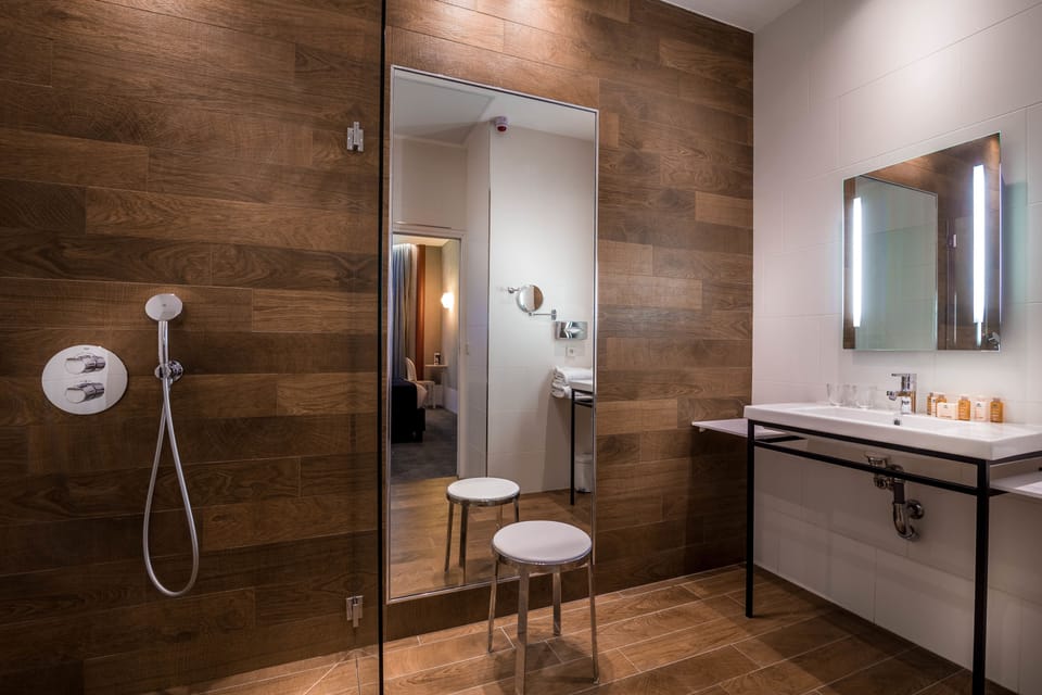 Shower, hair dryer, slippers, towels
