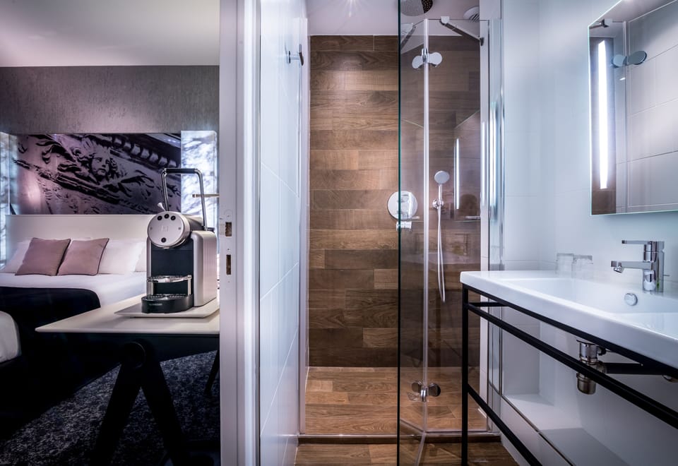 Shower, hair dryer, slippers, towels