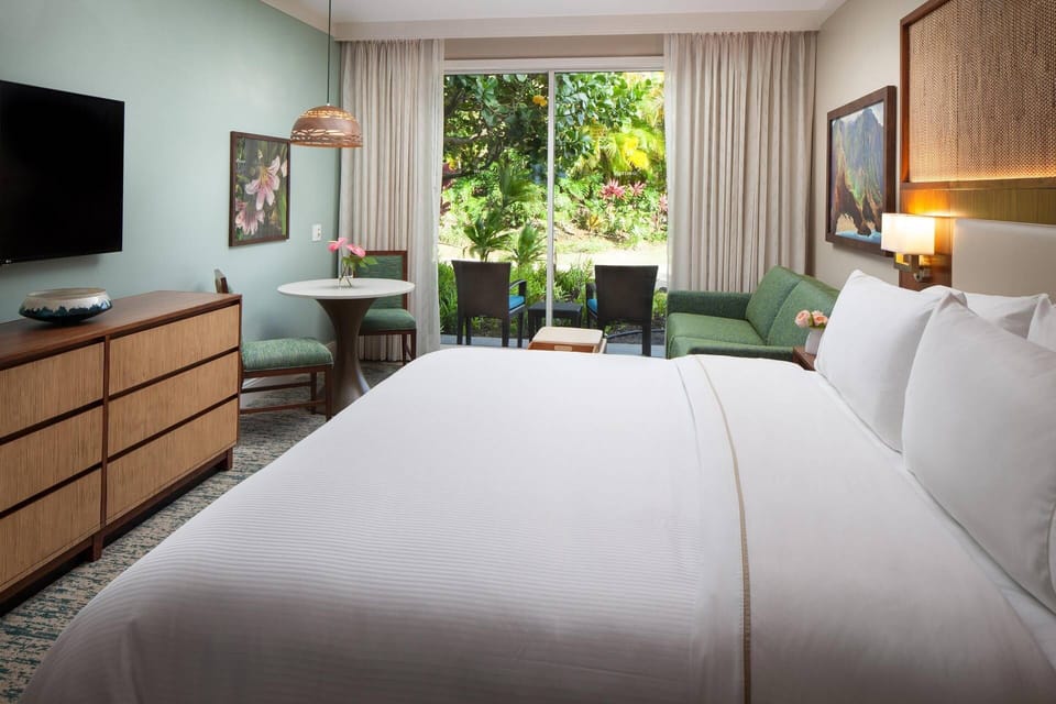 Guest bedroom comes with a small dining table for 2 and separate patio.