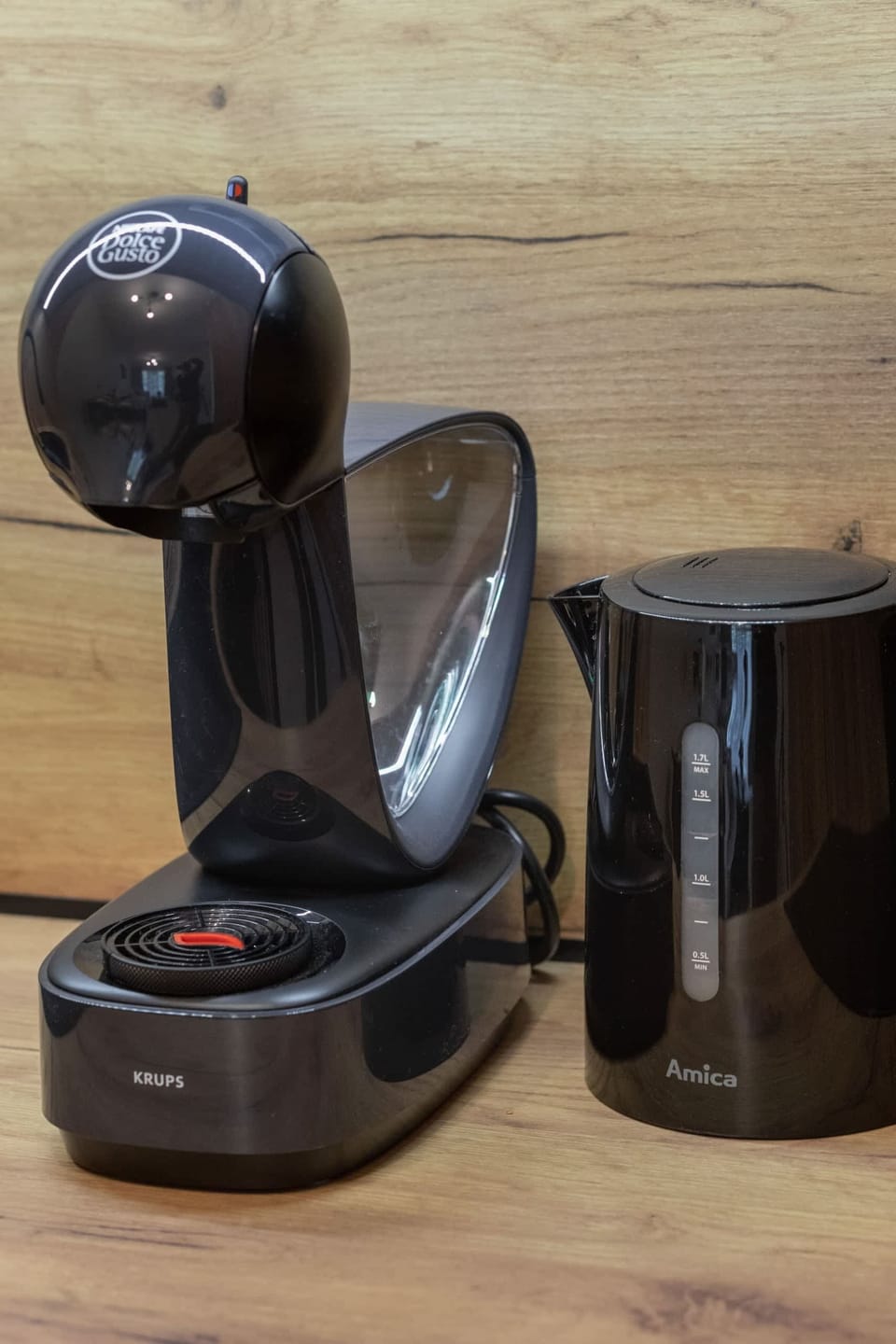 A coffee machine and kettle.


