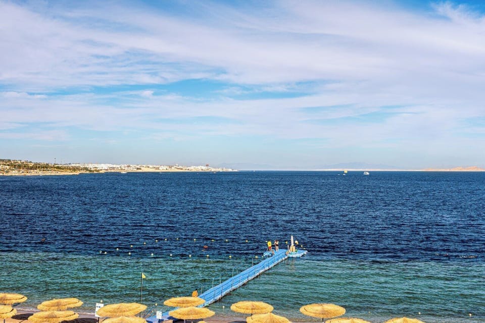 Private beach, free beach shuttle, beach cabanas, sun loungers