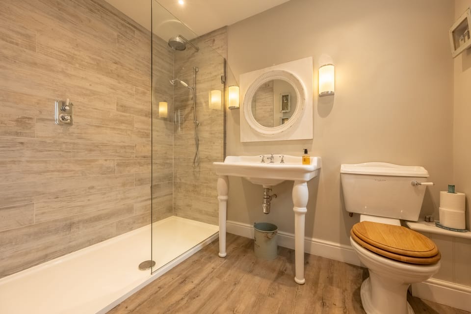 First floor: Stylish shower room with WC