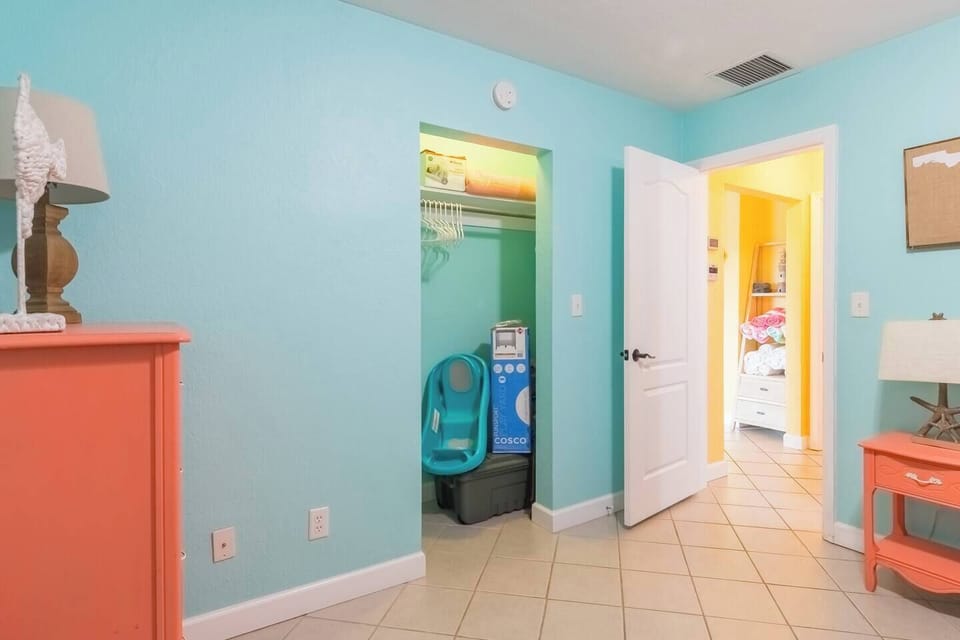 Closet with pack n play and baby bath!