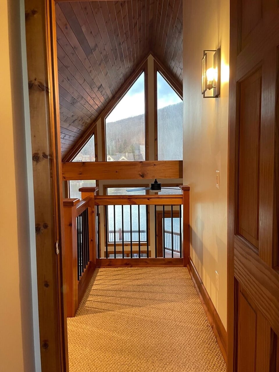 Wake up to lake views in primary bedroom #2.