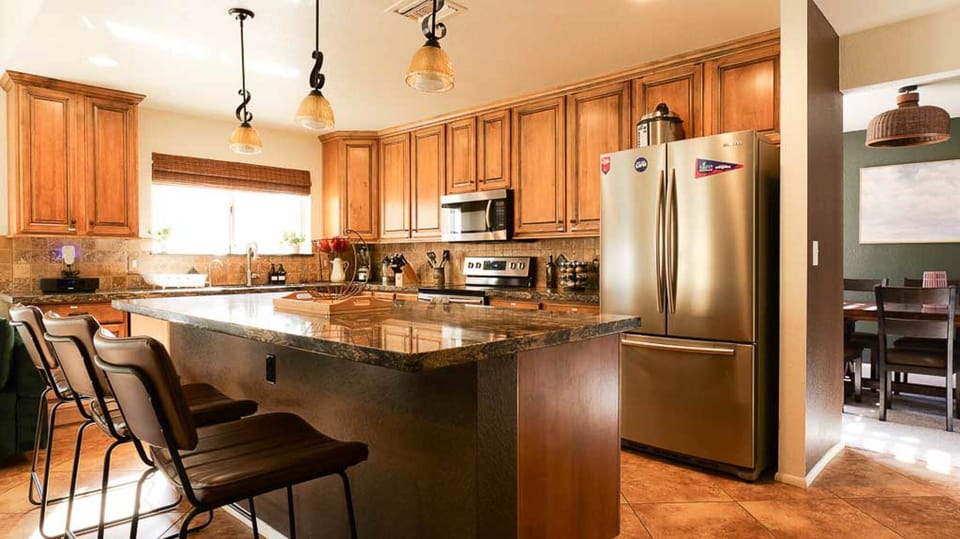 Large Fridge and Kitchen with Island and tons of counter space