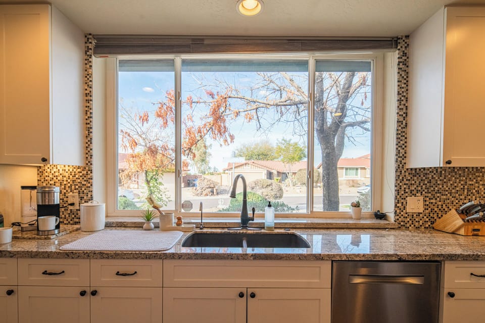 Gorgeous Fully Loaded Kitchen with beautiful views and large windows.