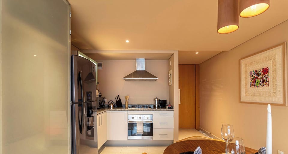 Exclusive Apartment | Private kitchen | Full-size fridge, microwave, oven, stovetop