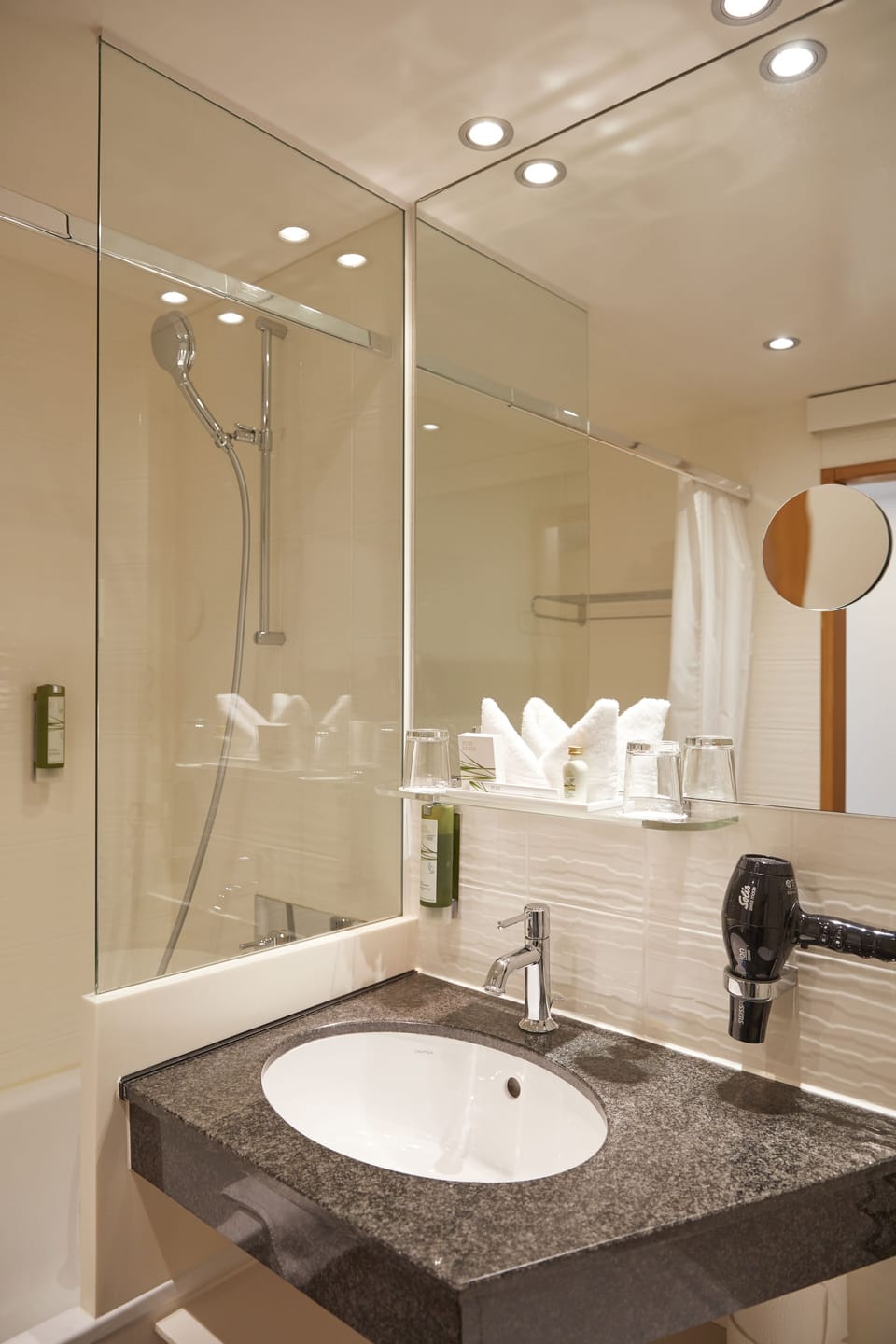 Hydromassage showerhead, designer toiletries, hair dryer, bathrobes