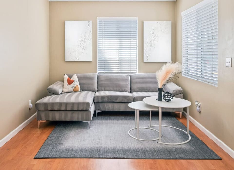 Natural light floods this beautiful living area, creating a welcoming ambiance.