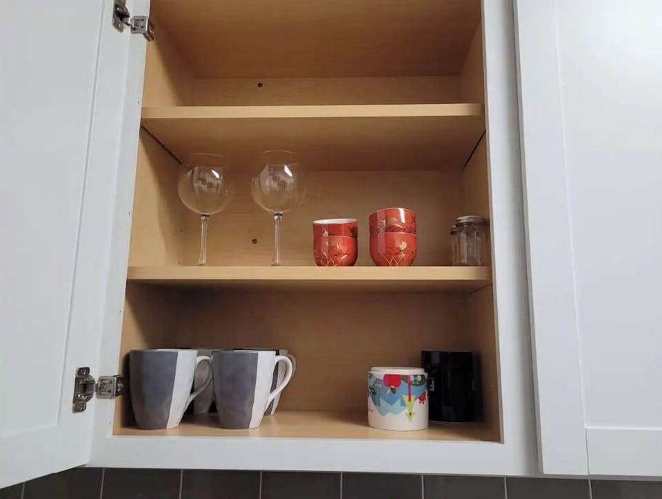 Kitchen includes dishes, glassware, utensils, etc. 