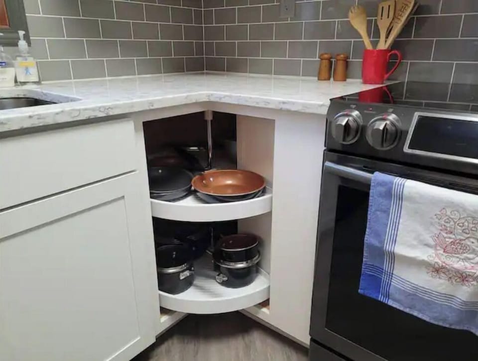 Kitchen includes utensils and cookware.