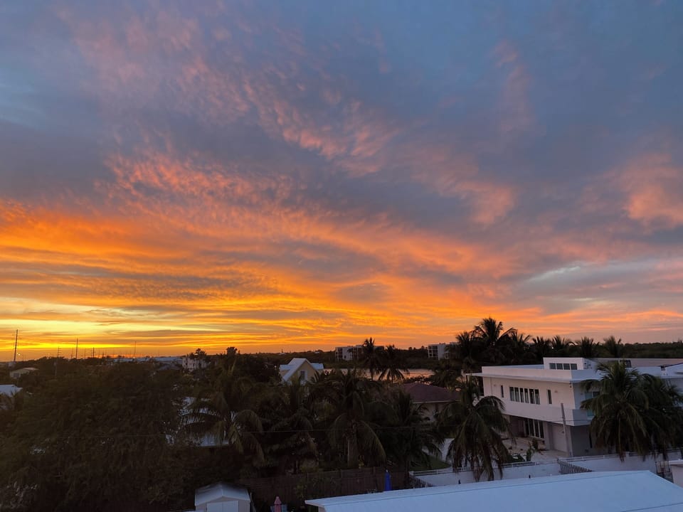 Rooftop sunsets included