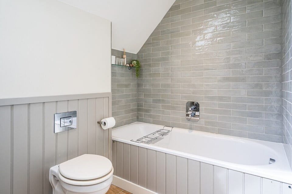 The en-suite in bedroom 3 is actually complete with a bath tub, perfect for those at home spa experiences. 