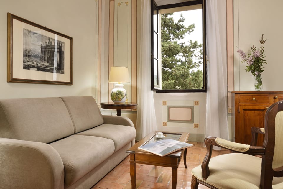 Premier Suite | Living area | Flat-screen TV