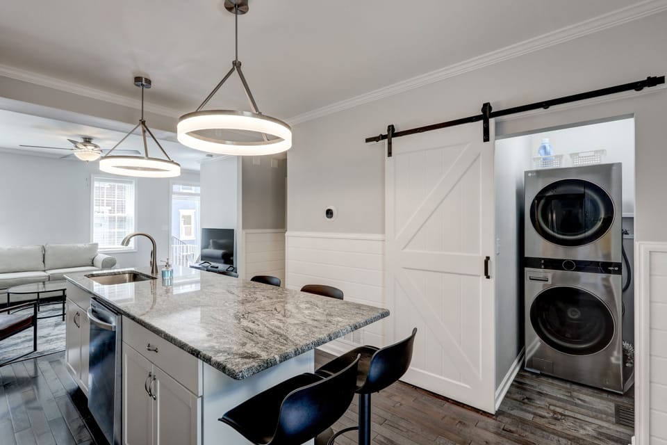 Use the laundry machine (stacked w&d) with complimentary laundry soap