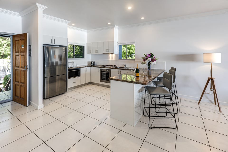 Panoramic Apartment | Private kitchen | Full-size fridge, microwave, oven, stovetop