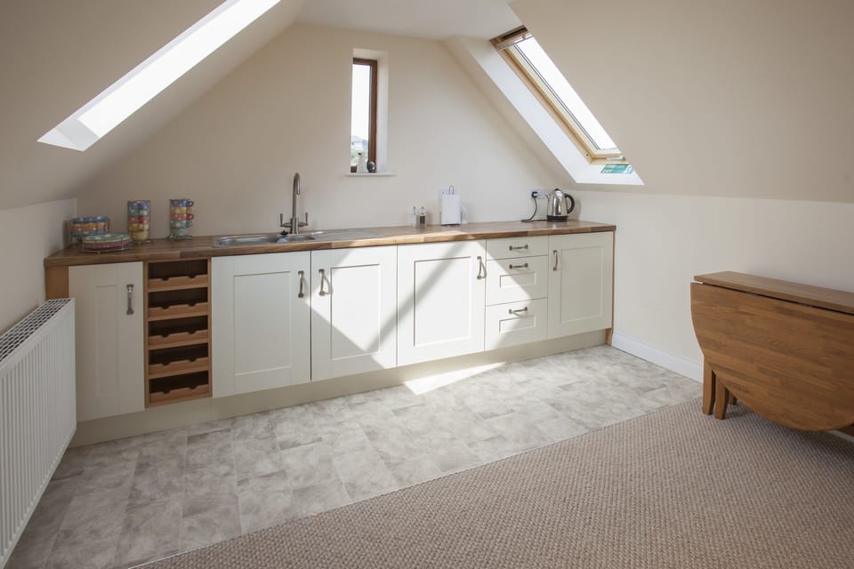 Lounge kitchen area of Genesta Holiday Cottage, St Minver, North Cornwall