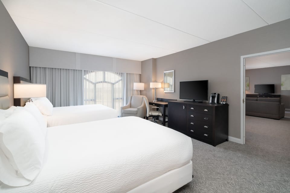 Hypo-allergenic bedding, desk, blackout drapes, iron/ironing board